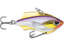 Load image into Gallery viewer, The Rap-V Blade purpledescent lure is the perfect balance of metal and plastic. This hard bait produces instant vibration on the lift or retrieve. The Rap-V lure can be worked in variable depths with a wide-range of techniques; cast out, make contact with bottom, lift &amp; let fall in a yo-yo style retrieve. For vertical presentation there is two line tie positions; front line tie for a slower fall swimming action, rear line tie for a faster fall, head down action.

